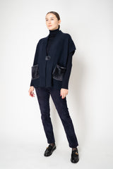 Manzoni 24 Wool Cashmere Knit Poncho with Shearling Pockets in Navy Vancouver. Shop Online or in Store