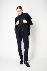 Manzoni 24 Wool Cashmere Knit Poncho with Shearling Pockets in Navy Vancouver. Shop Online or in Store