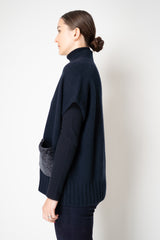 Manzoni 24 Wool Cashmere Knit Poncho with Shearling Pockets in Navy Vancouver. Shop Online or in Store