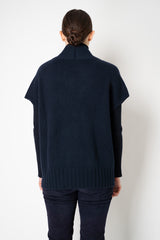 Manzoni 24 Wool Cashmere Knit Poncho with Shearling Pockets in Navy Vancouver. Shop Online or in Store