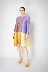 Pleats Please Issey Miyake "Photon" Bounce Tunic in Purple and Yellow Vancouver. Shop Online or in Store.