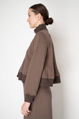 MeiMeiJ Stretch Viscose Cropped Peplum Track Jacket in Stone Taupe Vancouver. Shop Online or in Store.