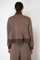 MeiMeiJ Stretch Viscose Cropped Peplum Track Jacket in Stone Taupe Vancouver. Shop Online or in Store.