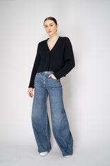 Moschino Jeans Knitted V-Neck Cardigan with Branded Logo at the Back in Black Vancouver. Shop Online or in Store.