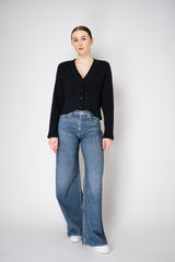 Moschino Jeans Knitted V-Neck Cardigan with Branded Logo at the Back in Black Vancouver. Shop Online or in Store.
