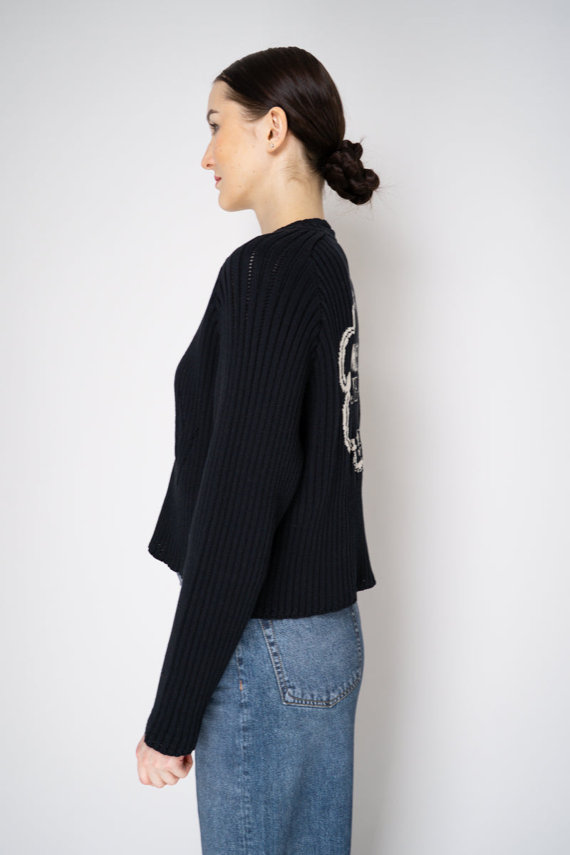 Moschino Jeans Knitted V-Neck Cardigan with Branded Logo at the Back in Black Vancouver. Shop Online or in Store.