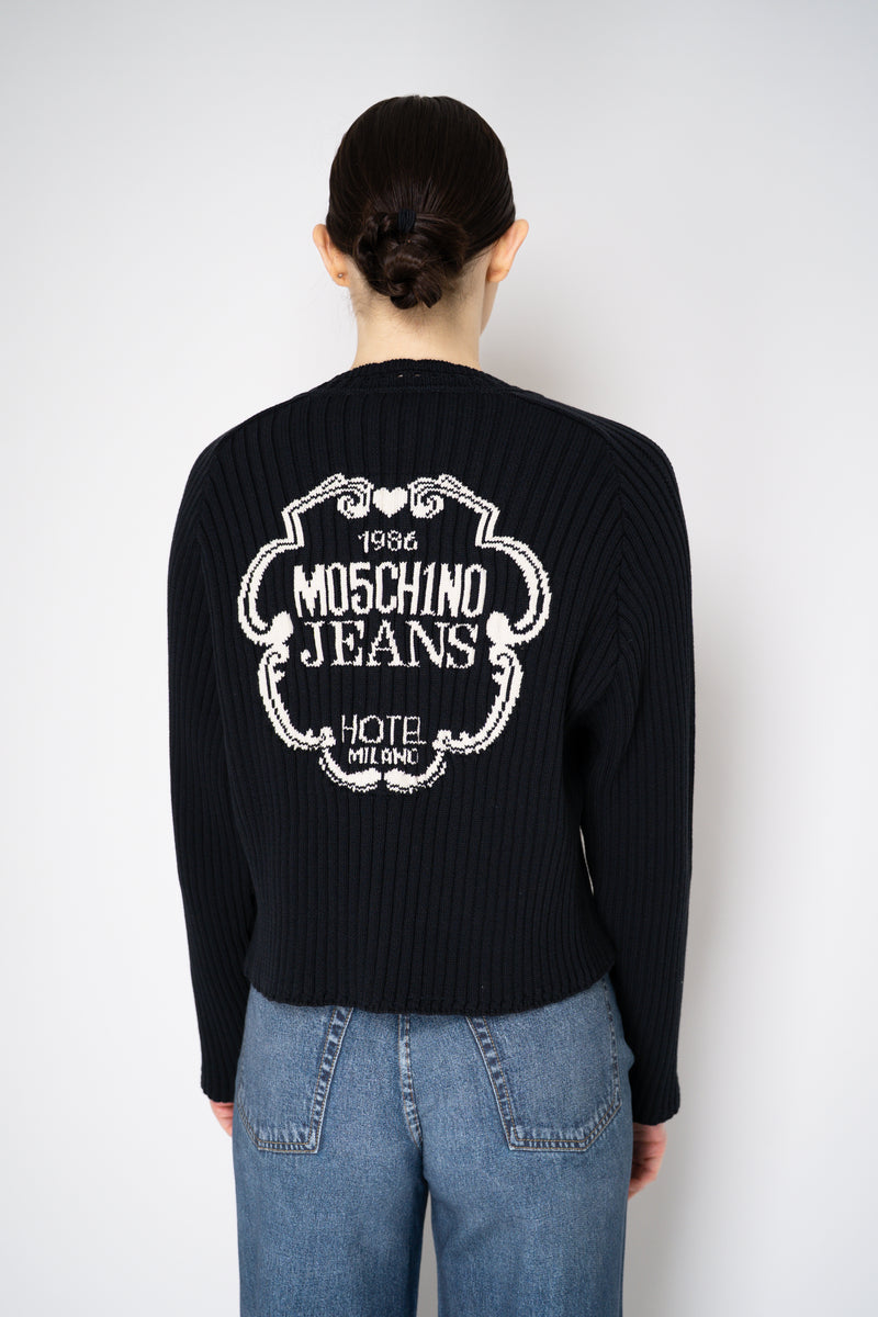 Moschino Jeans Knitted V-Neck Cardigan with Branded Logo at the Back in Black Vancouver. Shop Online or in Store.