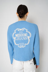 Moschino Jeans Knitted V-Neck Cardigan with Branded Logo at the Back in Blue Vancouver. Shop Online or in Store.