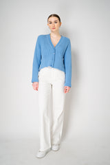 Moschino Jeans Knitted V-Neck Cardigan with Branded Logo at the Back in Blue Vancouver. Shop Online or in Store.