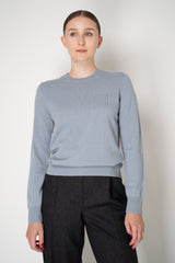 Peserico Wool Cashmere Knit Crew Neck Sweater with Embellished Faux Pocket in Dusty Blue Vancouver. Shop Online or in Store.