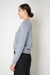 Peserico Wool Cashmere Knit Crew Neck Sweater with Embellished Faux Pocket in Dusty Blue Vancouver. Shop Online or in Store.