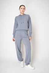 Peserico Wool Cashmere Relaxed Fit Knit Hooded Pullover with Faux Pocket in Dusty Blue Vancouver. Shop Online or in Store.