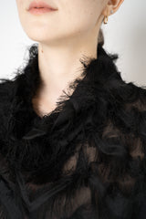 Peter O. Mahler High Neck Fringed Long Sleeve Jersey Top in Black Vancouver. Shop Online or in Store.