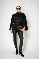 Peter O. Mahler High Neck Fringed Long Sleeve Jersey Top in Black Vancouver. Shop Online or in Store.