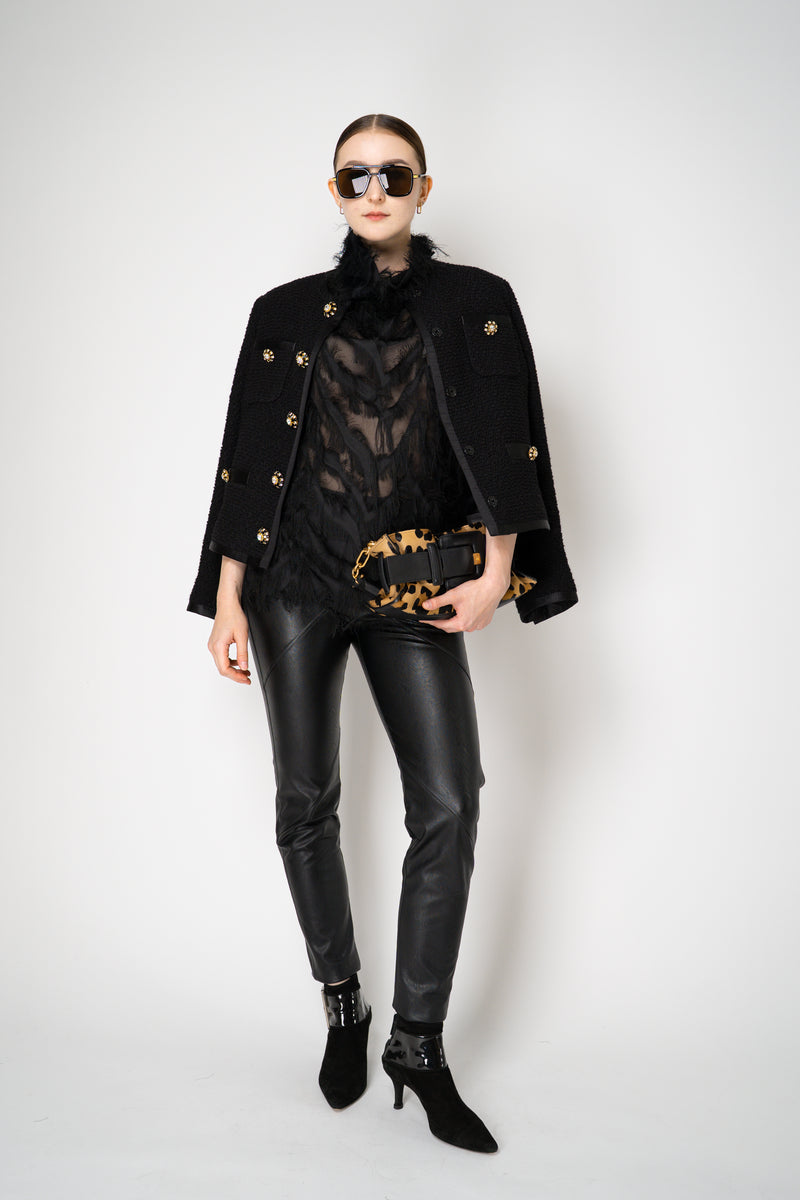 Peter O. Mahler High Neck Fringed Long Sleeve Jersey Top in Black Vancouver. Shop Online or in Store.