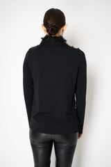 Peter O. Mahler High Neck Fringed Long Sleeve Jersey Top in Black Vancouver. Shop Online or in Store.