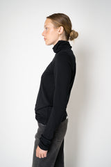Peter O. Mahler Long Sleeve Turtleneck Jersey Pullover Top in Black Vancouver. Shop Online or in Store. 