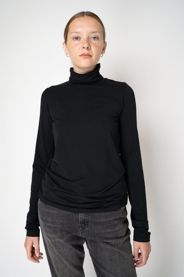 Peter O. Mahler Long Sleeve Turtleneck Jersey Pullover Top in Black Vancouver. Shop Online or in Store. 