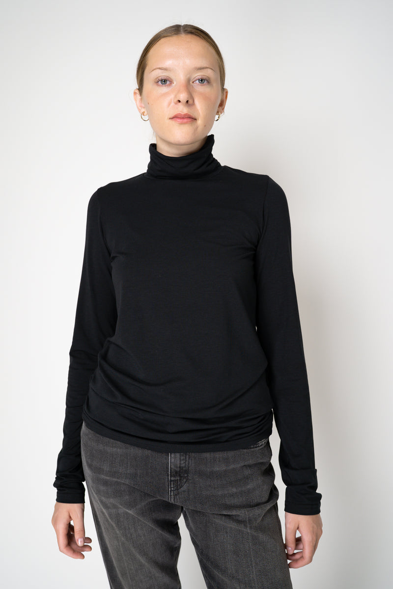 Peter O. Mahler Long Sleeve Turtleneck Jersey Pullover Top in Black Vancouver. Shop Online or in Store. 