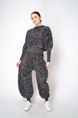 Pleats Please Issey Miyake A-Poc Nova Stretch Knit Wide Leg Jacquard Pants in Grey Vancouver. Shop Online or in Store. 
