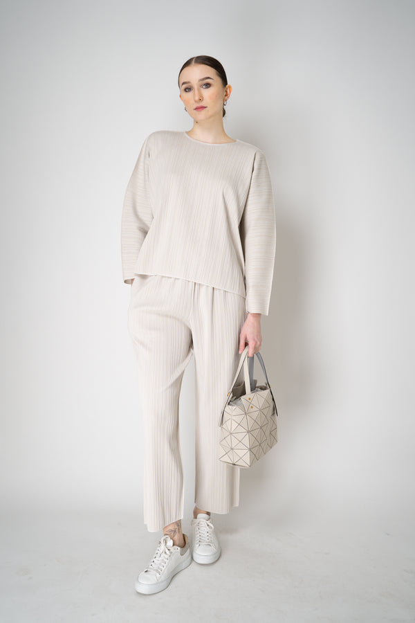 Pleats Please Issey Miyake A-Poc Shell Round Neck Knitted Top in Off-White Vancouver. Shop Online or in Store.