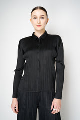 Pleats Please Issey Miyake Basics Collared Button-Up Jacket in Black Vancouver. Shop Online or in Store.