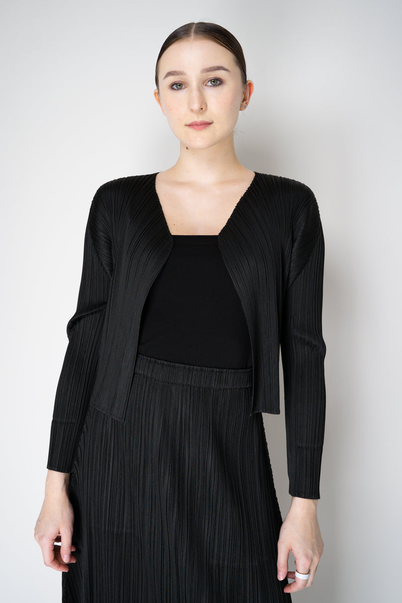 Pleats Please Issey Miyake Basics Cropped Open Front Cardigan in Black Vancouver. Shop Online or in Store.