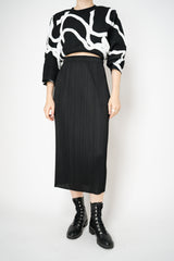 Pleats Please Issey Miyake Basics Midi Skirt in Black Vancouver. Shop Online or in Store.