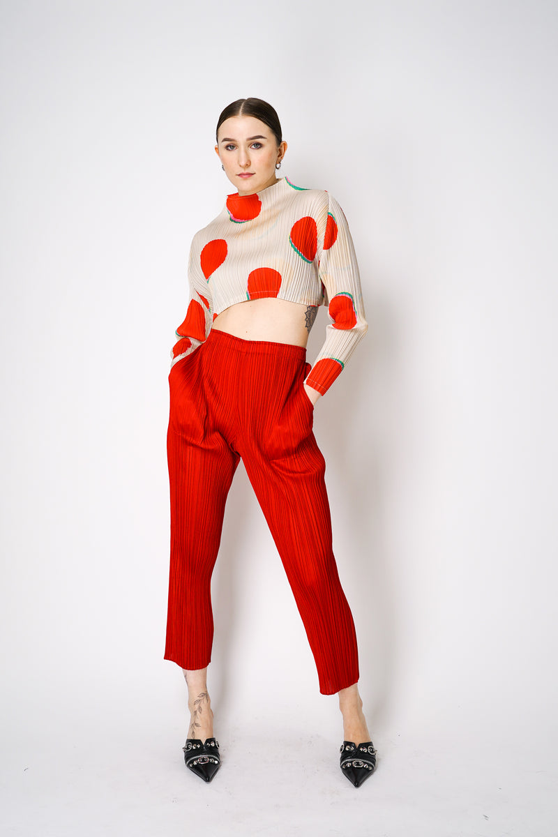 Pleats Please Issey Miyake "Bean Dots" Cropped Mock neck Top in Red Vancouver. Shop online or in store