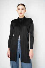Pleats Please Issey Miyake Button-Up Cardigan Jacket in Black Vancouver. Shop Online or in Store.