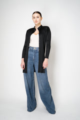 Pleats Please Issey Miyake Button-Up Cardigan Jacket in Black Vancouver. Shop Online or in Store.