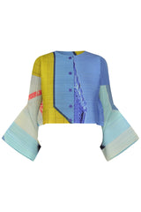 Pleats Please Issey Miyake City Collage Cropped Cardigan in Light Blue Print Vancouver. Shop Online or in Store.