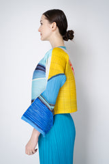Pleats Please Issey Miyake City Collage Cropped Cardigan in Light Blue Print Vancouver. Shop Online or in Store.