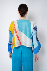 Pleats Please Issey Miyake City Collage Cropped Cardigan in Light Blue Print Vancouver. Shop Online or in Store.