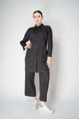 Pleats Please Issey Miyake Cotton Denim Collared Coat in Dark Grey Wash Vancouver. Shop Online or in Store.