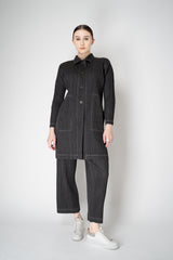 Pleats Please Issey Miyake Cotton Denim Collared Coat in Dark Grey Wash Vancouver. Shop Online or in Store.
