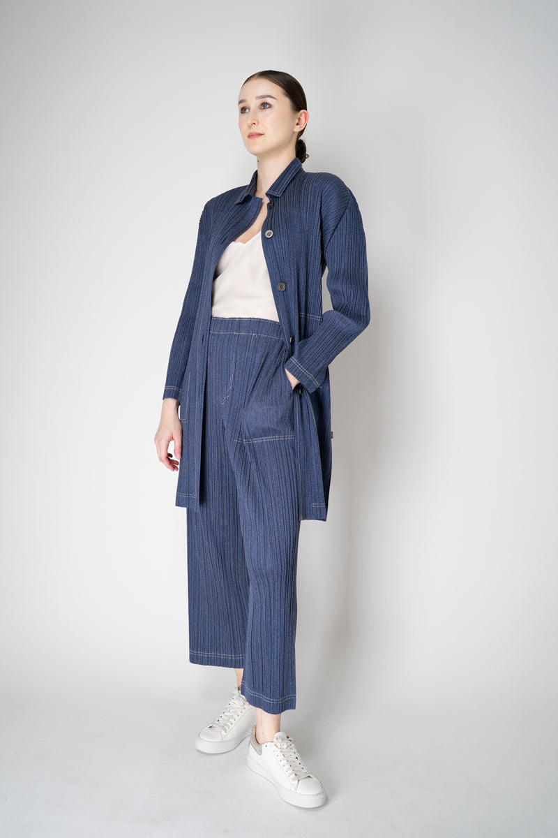 Pleats Please Issey Miyake Cotton Denim Collared Coat in Medium Blue Wash Vancouver. Shop Online or in Store.