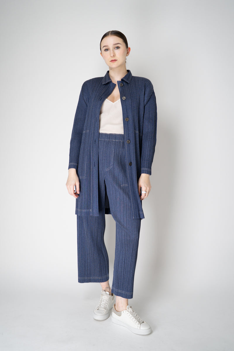 Pleats Please Issey Miyake Cotton Denim Collared Coat in Medium Blue Wash Vancouver. Shop Online or in Store.