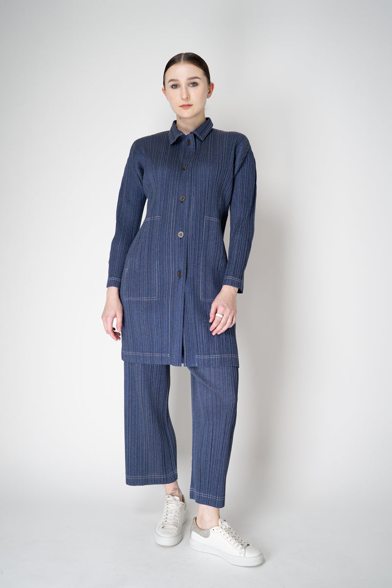 Pleats Please Issey Miyake Cotton Denim Collared Coat in Medium Blue Wash Vancouver. Shop Online or in Store.