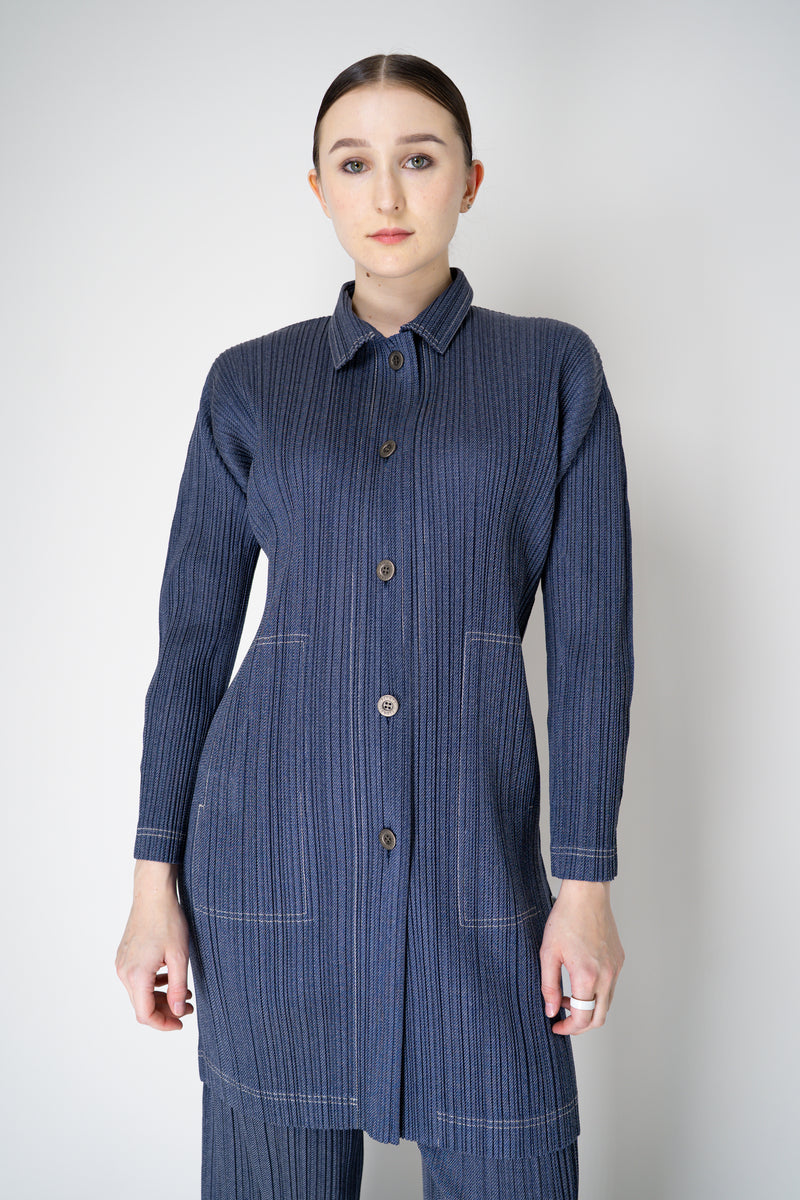 Pleats Please Issey Miyake Cotton Denim Collared Coat in Medium Blue Wash Vancouver. Shop Online or in Store.