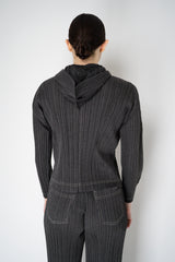 Pleats Please Issey Miyake Cotton Denim Cropped Zip Jacket in Dark Grey Wash Vancouver. Shop Online or in Store.