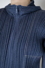 Pleats Please Issey Miyake Cotton Denim Cropped Zip Jacket in Medium Blue Wash Vancouver. Shop Online or in Store.