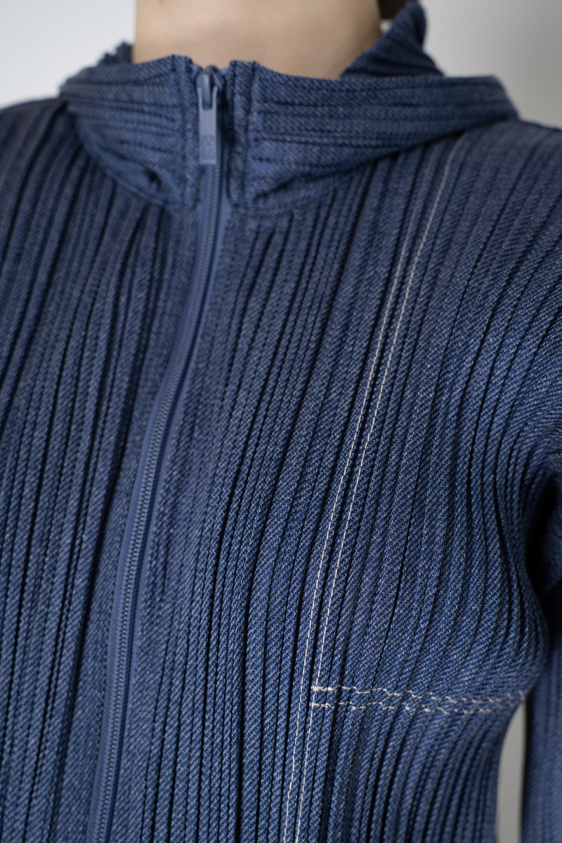 Pleats Please Issey Miyake Cotton Denim Cropped Zip Jacket in Medium Blue Wash Vancouver. Shop Online or in Store.