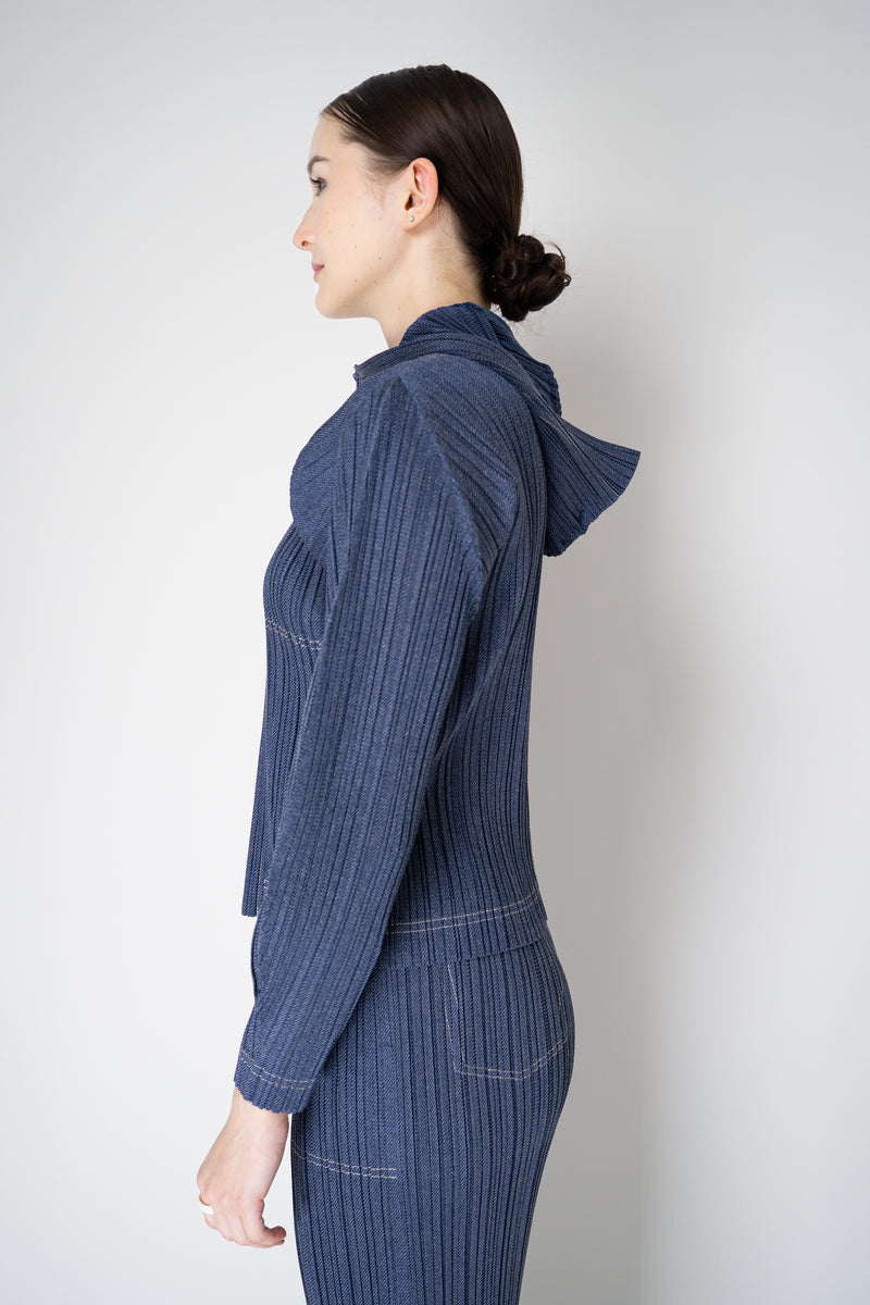 Pleats Please Issey Miyake Cotton Denim Cropped Zip Jacket in Medium Blue Wash Vancouver. Shop Online or in Store.