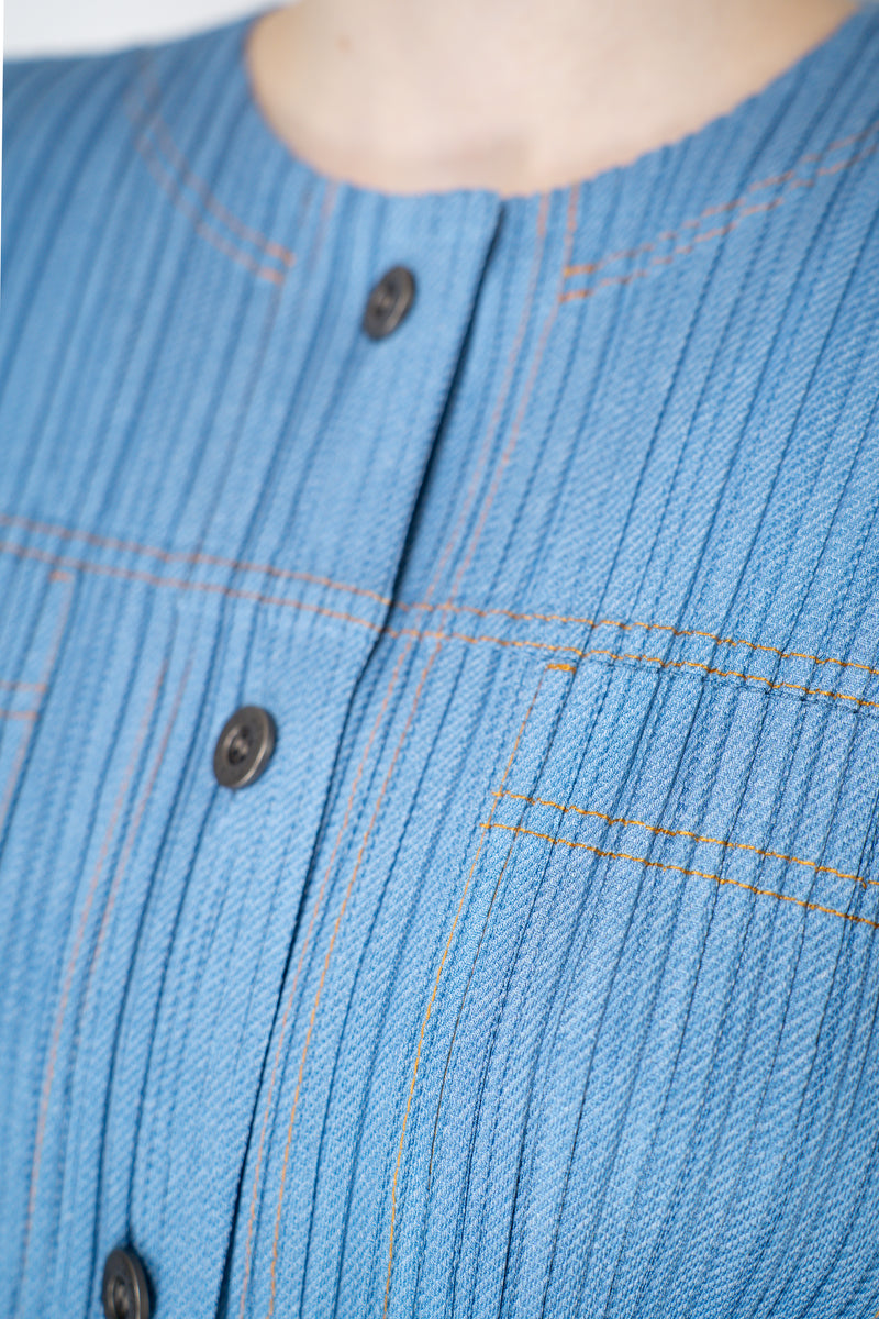 Pleats Please Issey Miyake Cotton Denim Pleated Jacket Vancouver. Shop Online or in Store.