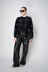 Pleats Please Issey Miyake Crossing Knit Stretch Crew Neck Sweater in Black Vancouver. Shop Online or in Store.