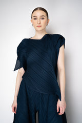Pleats Please Issey Miyake Flare Asymmetric Top in Navy Vancouver. Shop Online or in Store.