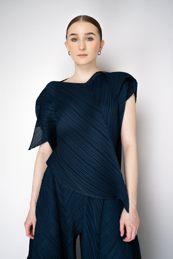 Pleats Please Issey Miyake Flare Asymmetric Top in Navy Vancouver. Shop Online or in Store.
