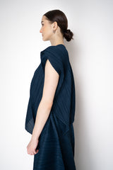 Pleats Please Issey Miyake Flare Asymmetric Top in Navy Vancouver. Shop Online or in Store.