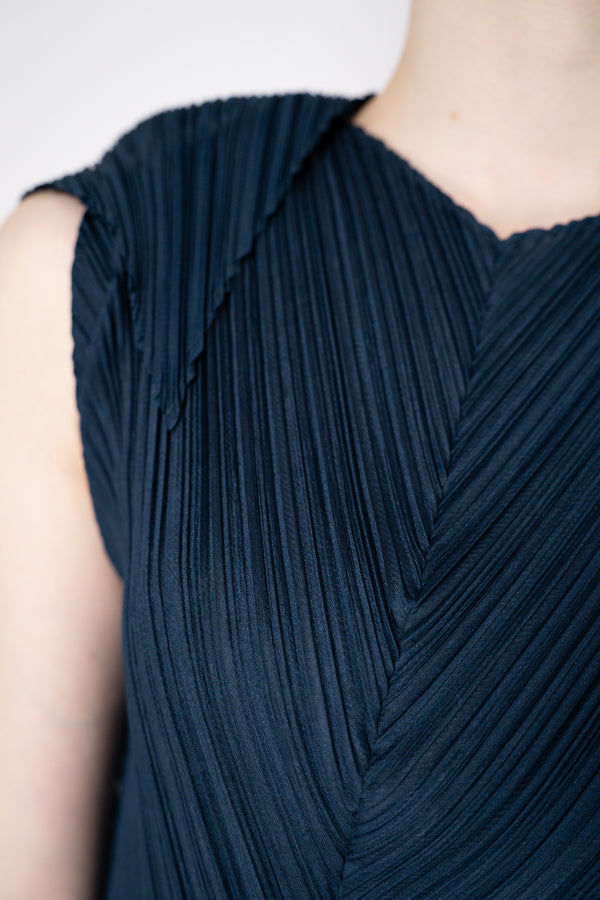 Pleats Please Issey Miyake Flare Sleeveless Dress in Navy Vancouver. Shop Online or in Store.
